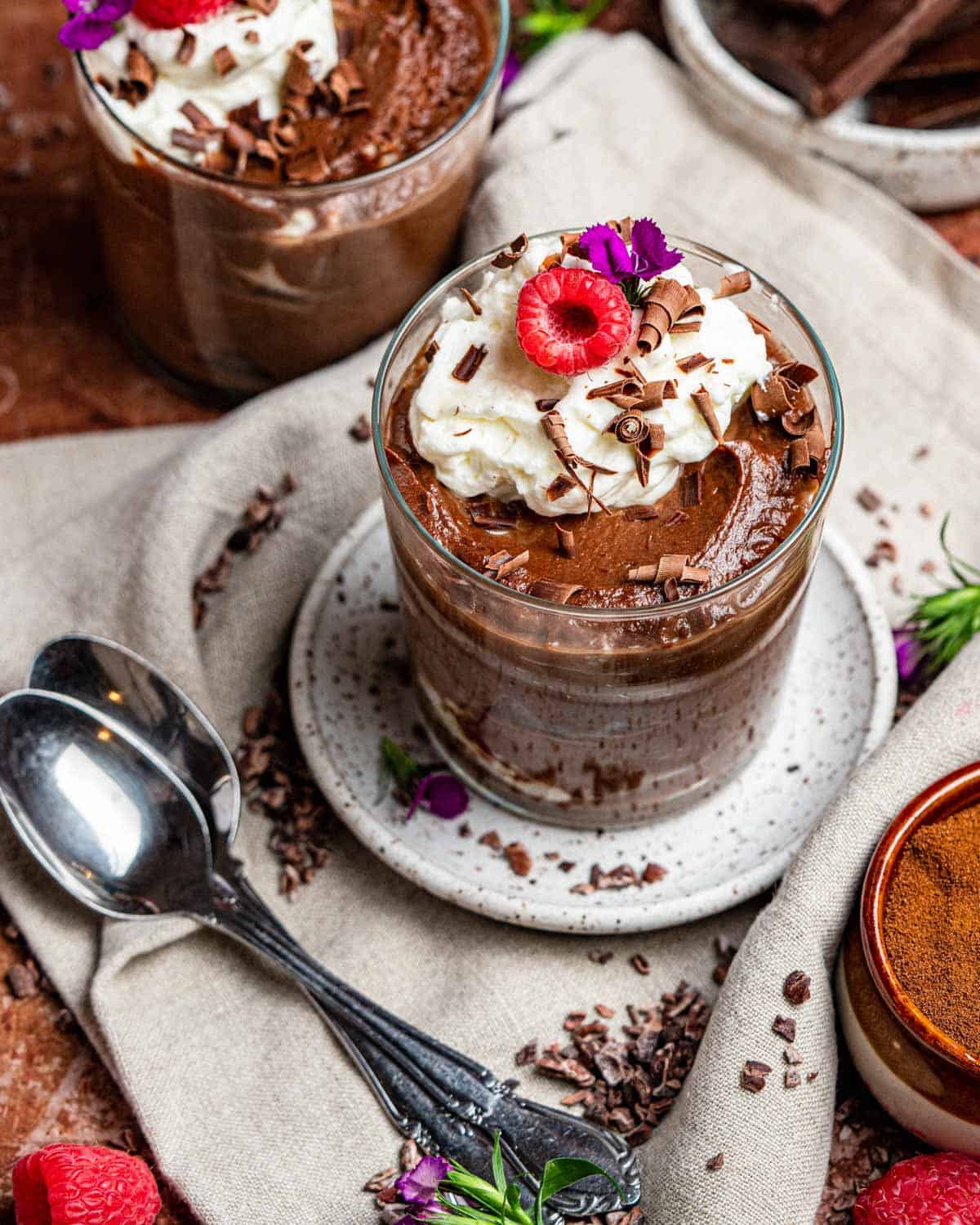 chocolate mascarpone mousse with whipped cream and spoons