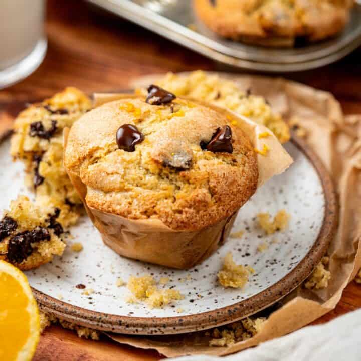orange chocolate chip muffin on a plate