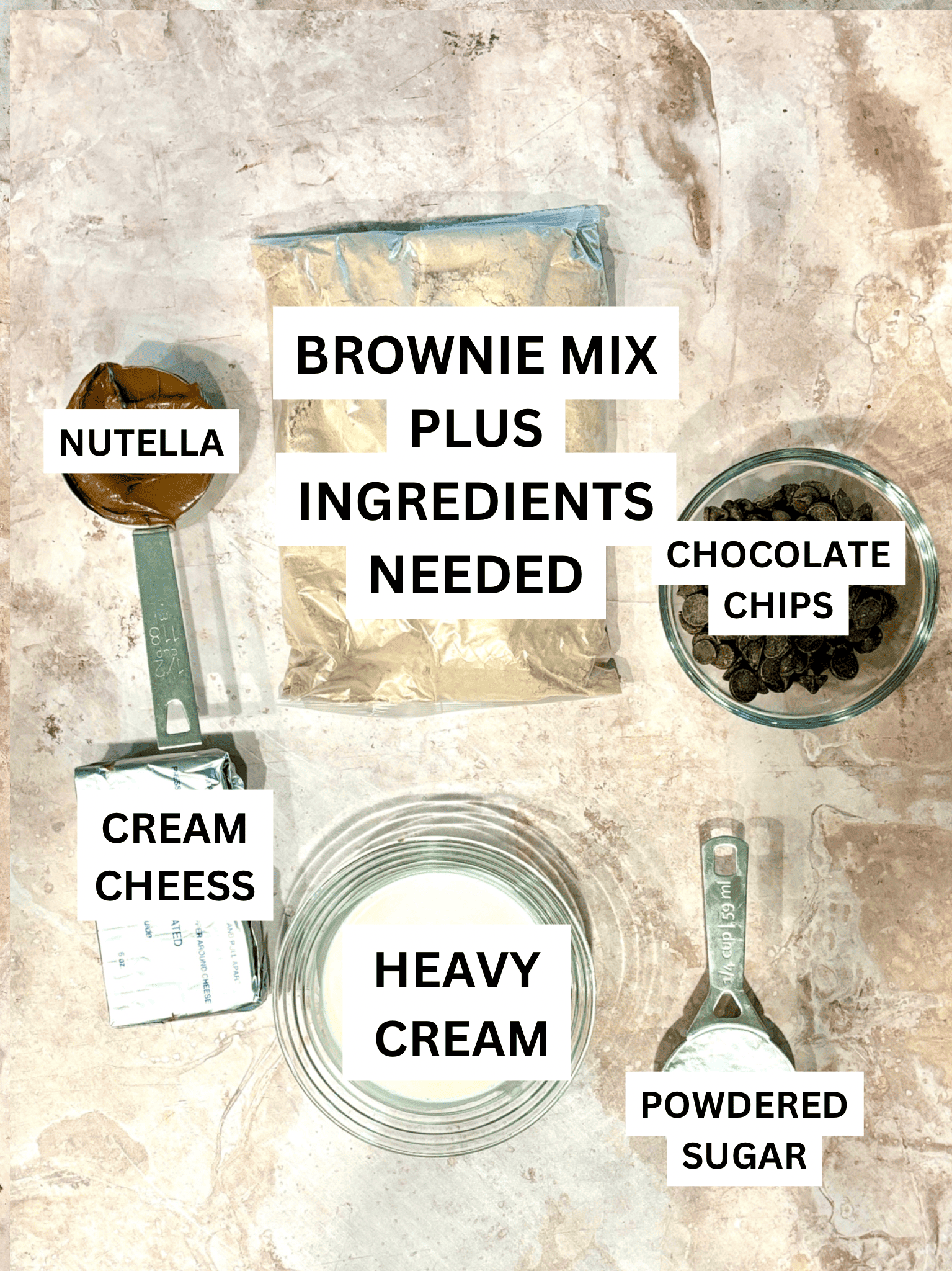 Ingredients layed out on the counter, brownie mix, cream cheese, powdered sugar, Nutella, and heavy cream.