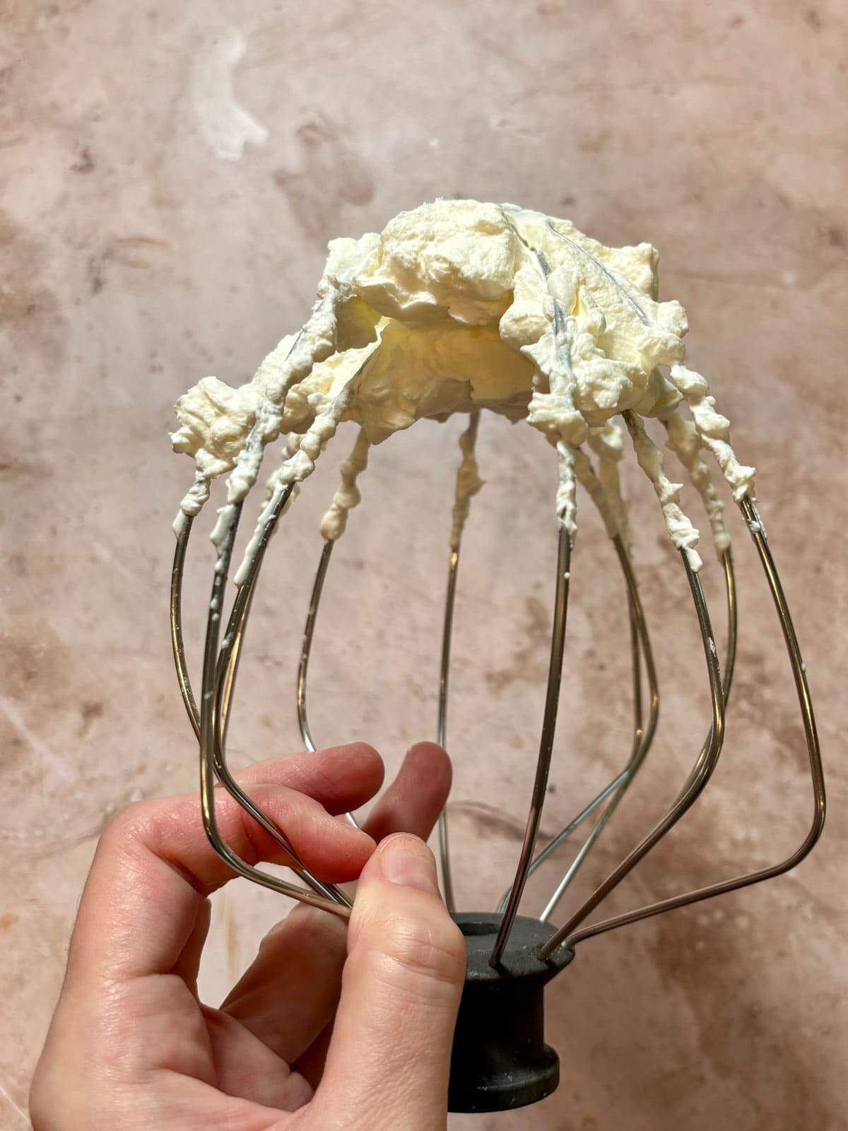 Heavy cream whipped to stiff peaks on the whisk attachment.