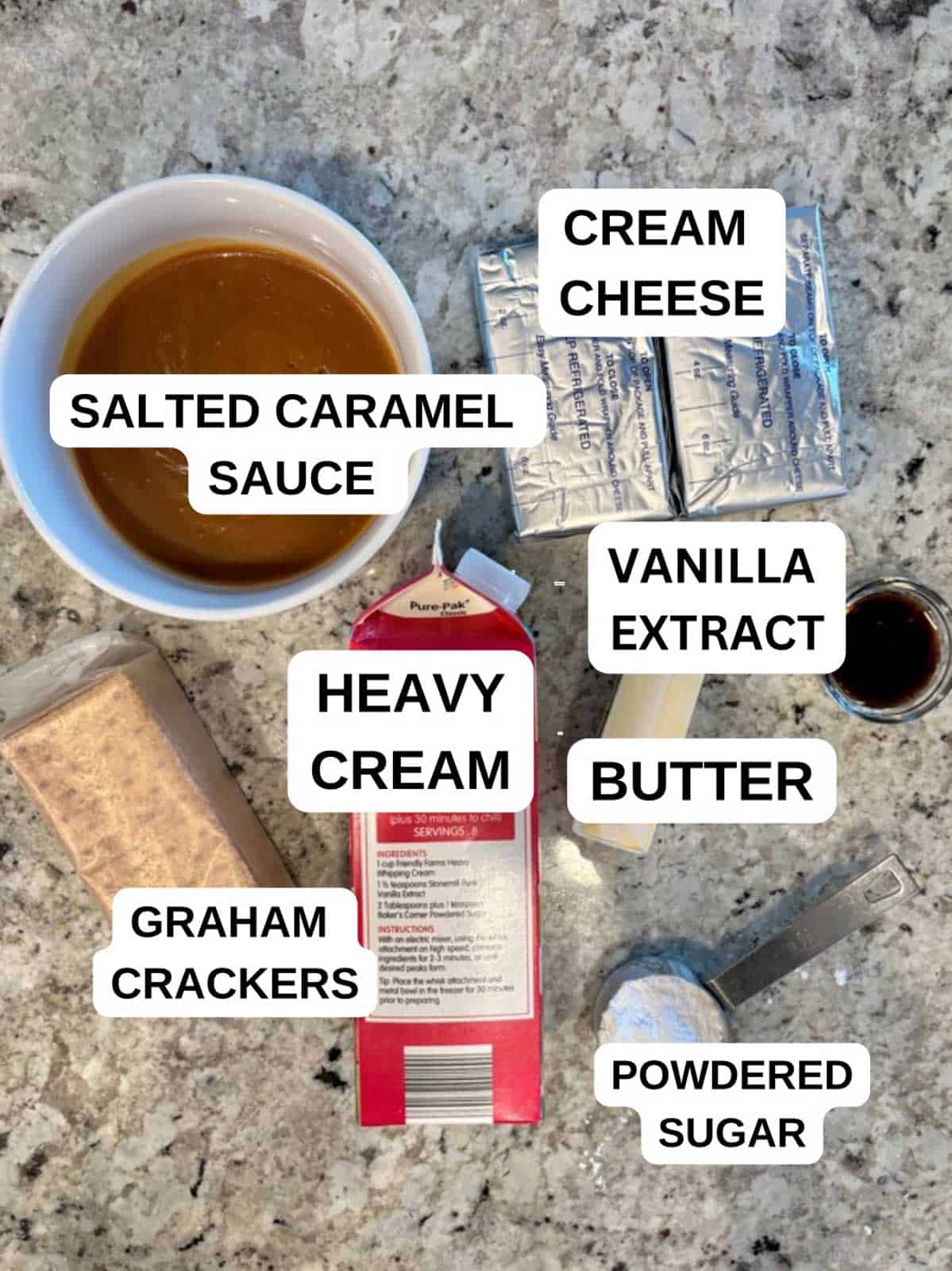 Ingredients for the caramel cheesecake recipe on the counter ready to be used.