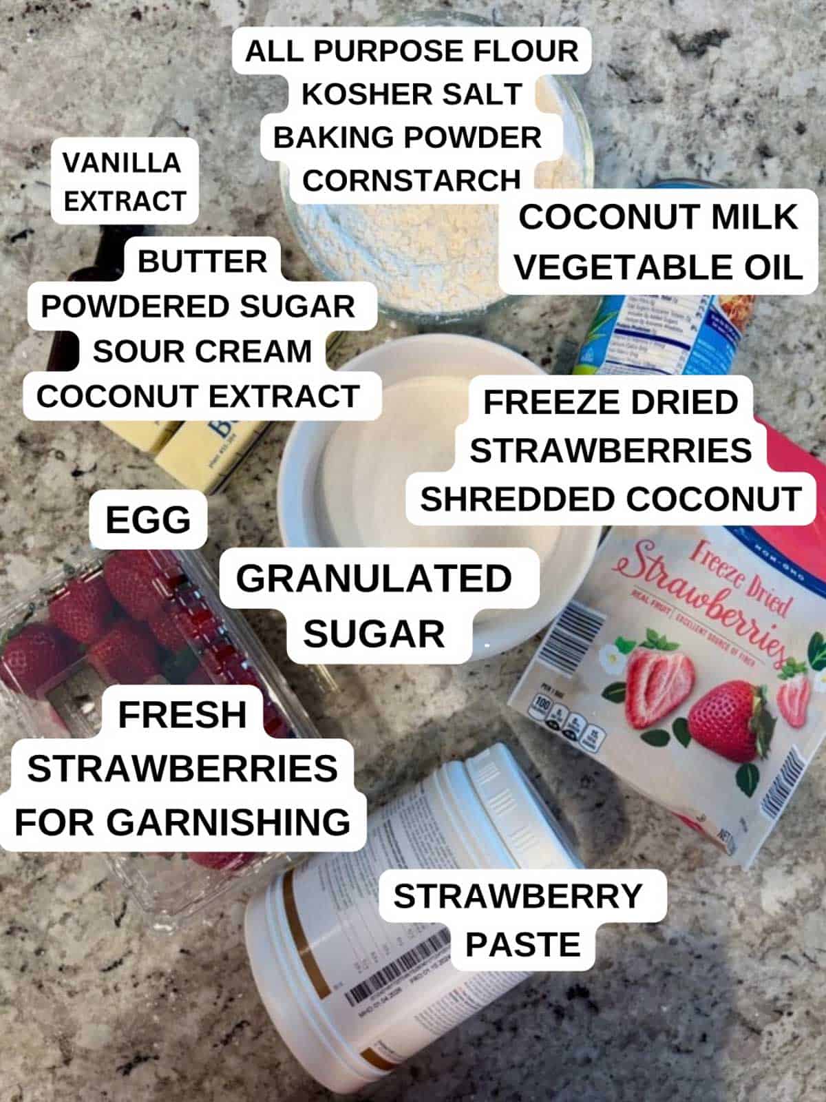 Ingredients for the cake recipe on the counter ready to be used and labeled.