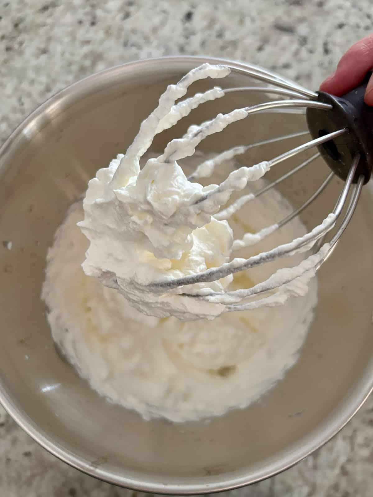 Heavy cream whipped until stiff peaks form on the whisk attachment.