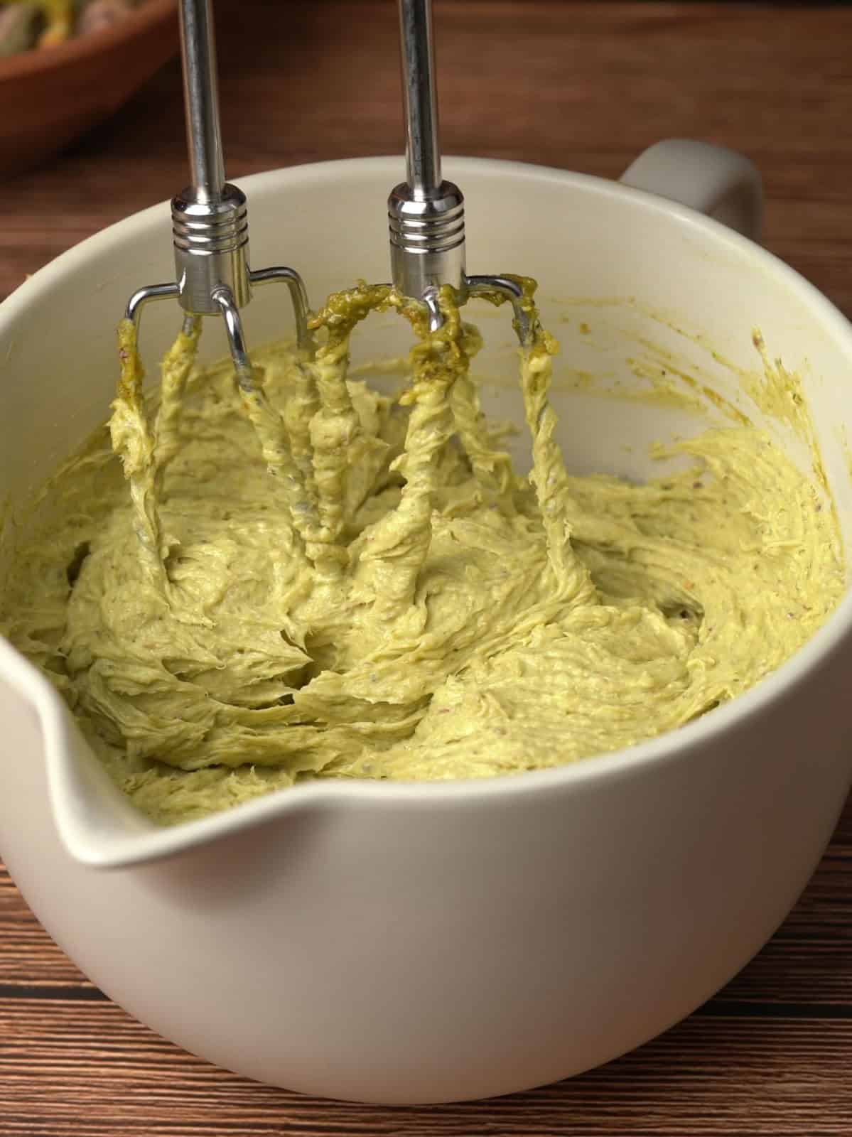 Cream cheese, pistachio paste, almond extract, and lemon juice mixed until smooth.