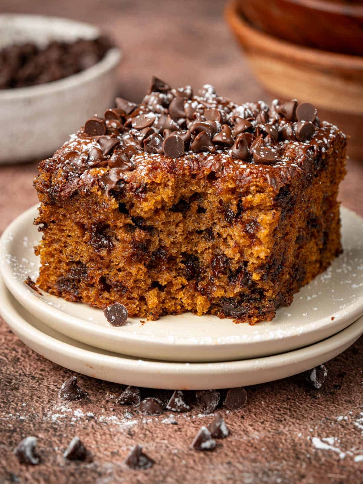 Pumpkin snack cake with chocolate chips on top and around.