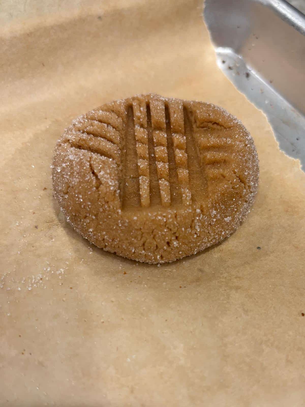 Fork marks on top of the cookie to make it a bit flat on parchment paper.