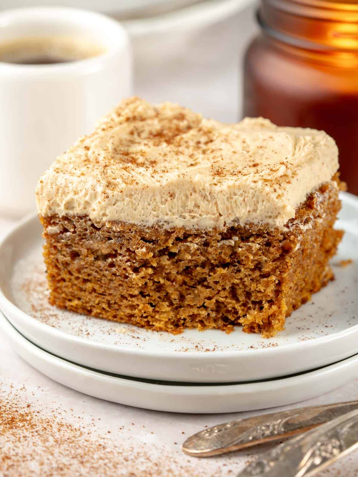 Pumpkin spice latte cake on a plate with forks.