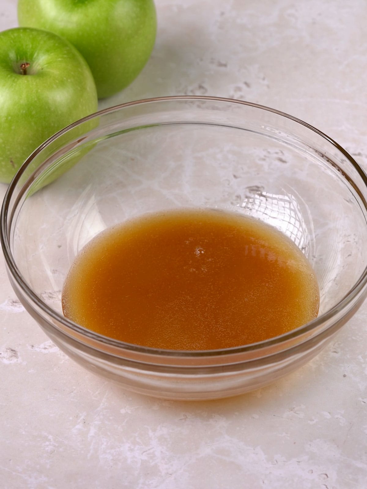 Browned butter in a glass bowl ready to be used.