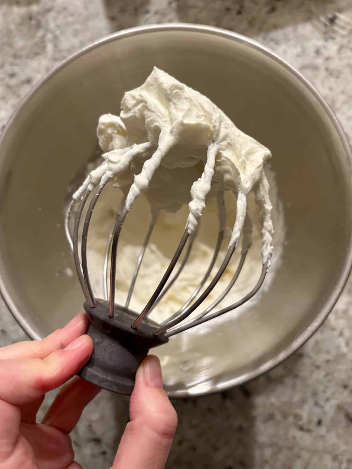 Heavy cream whipped until stiff peaks form on a beater.