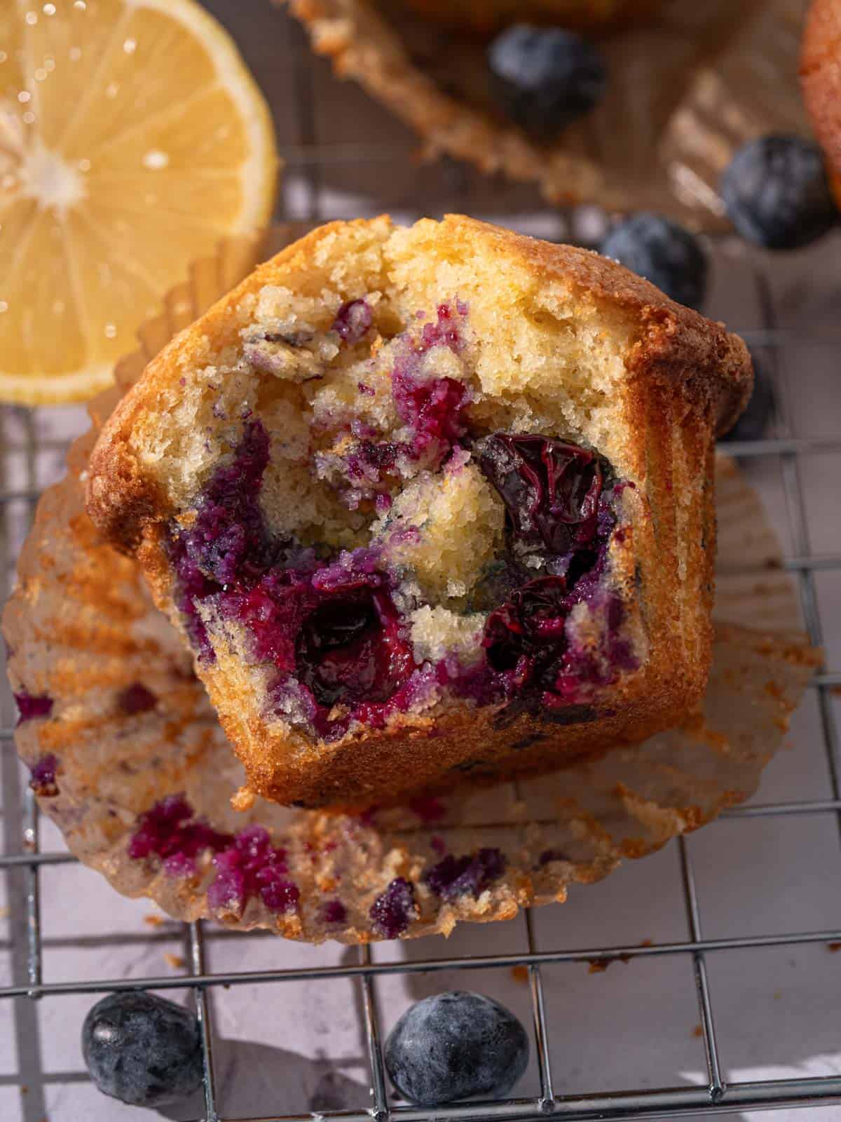 The inside of a muffin showing the blueberries and texture.