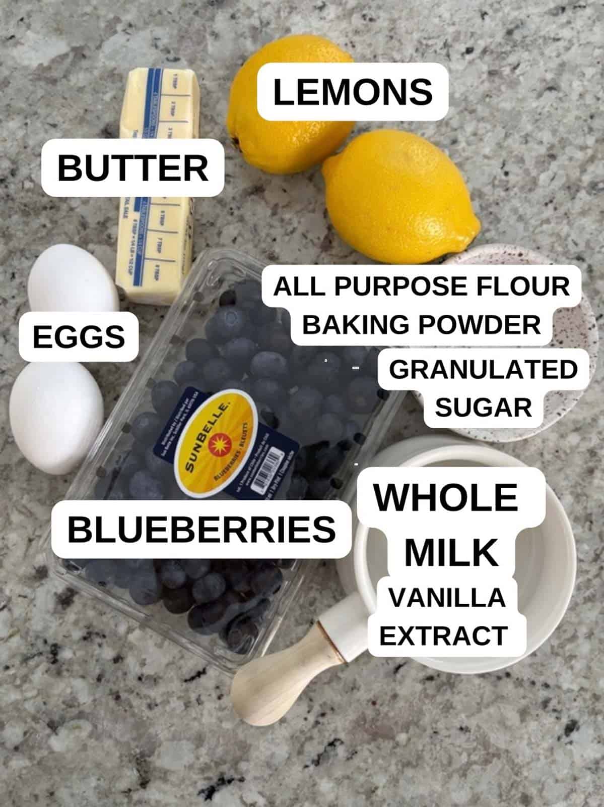 Ingredients for the blueberry lemon muffins on the counter labeled.
