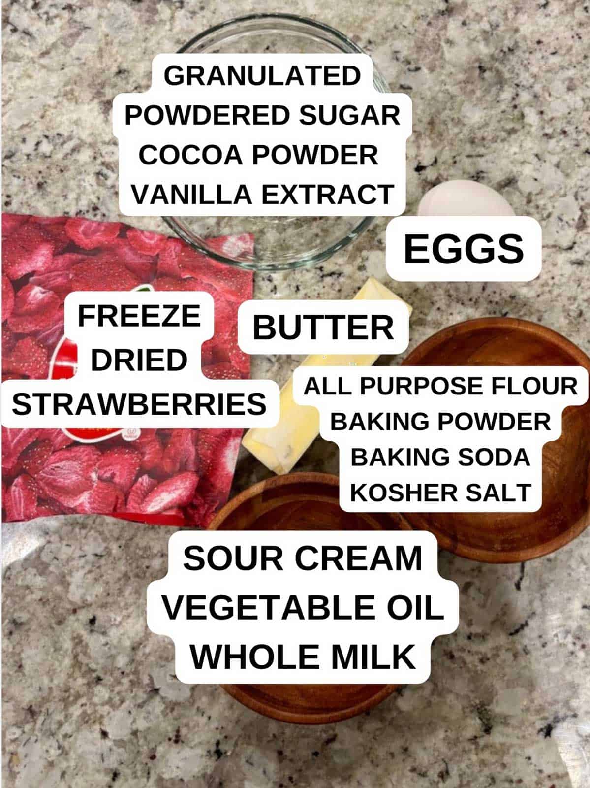 Ingredients on the counter for the chocolate cake and strawberry filling recipe.