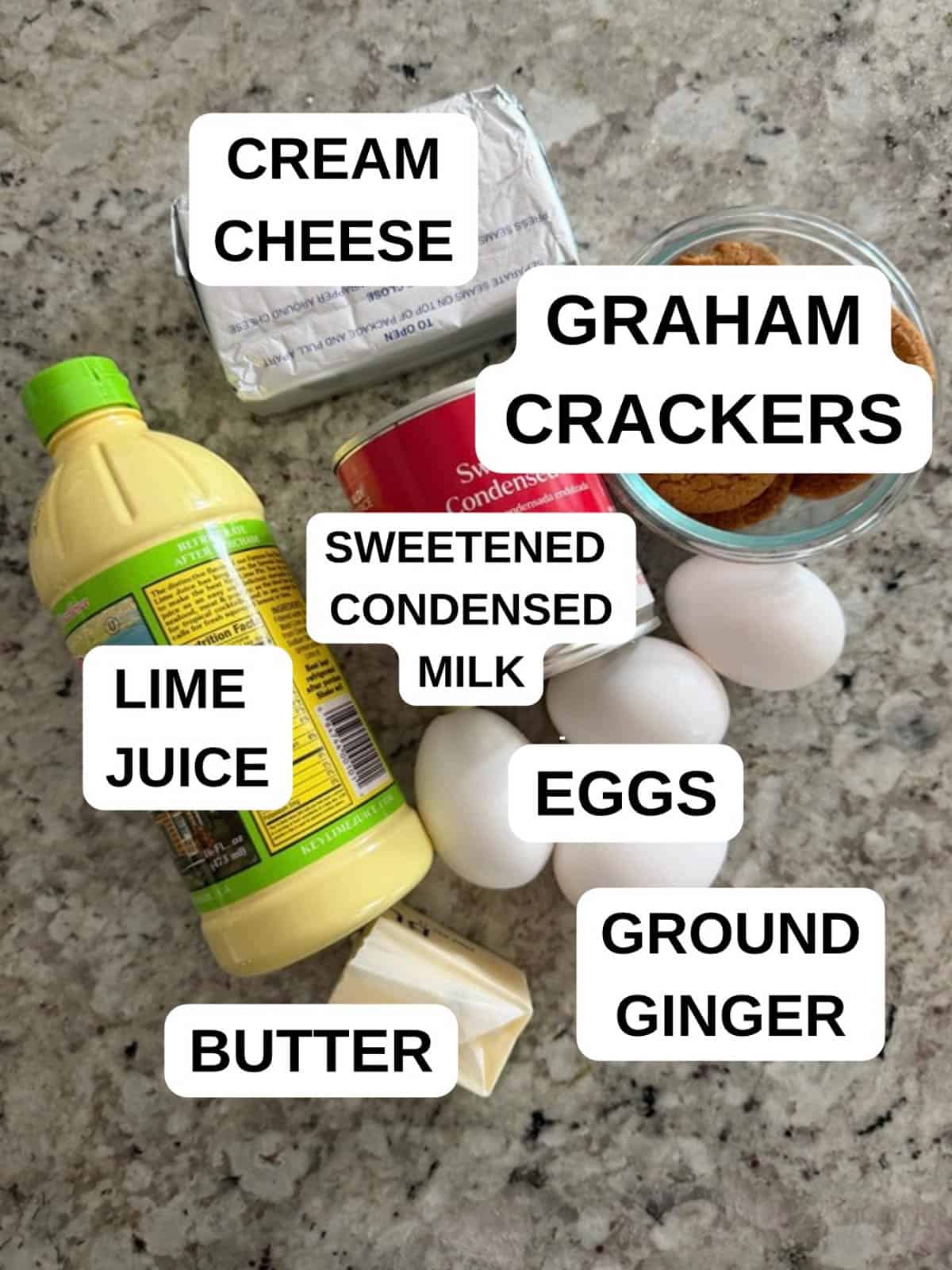 Ingredients for the ginger cheesecake recipe on the counter ready to be used.
