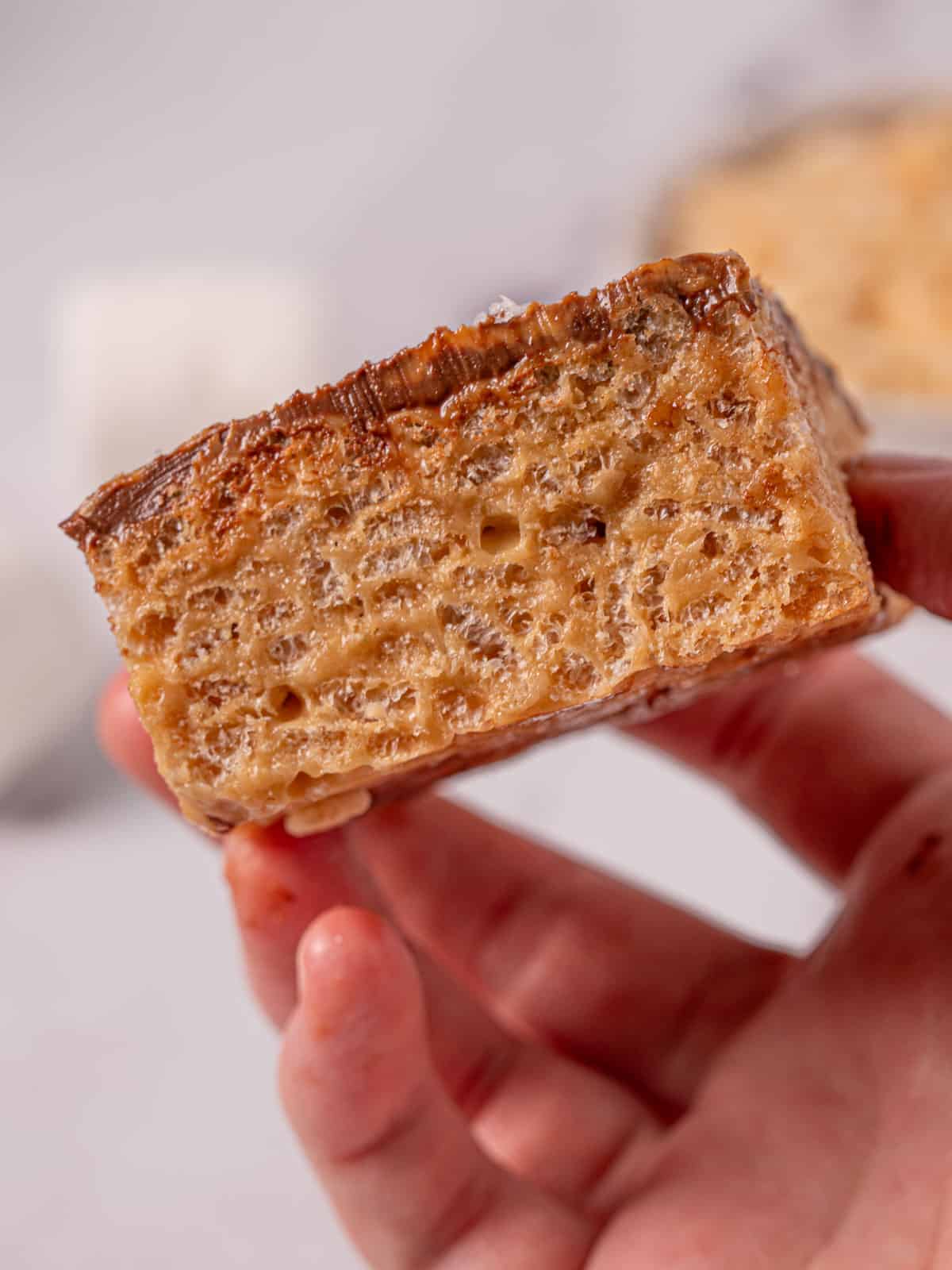 Showing the texture of the peanut butter rice crispy squares.