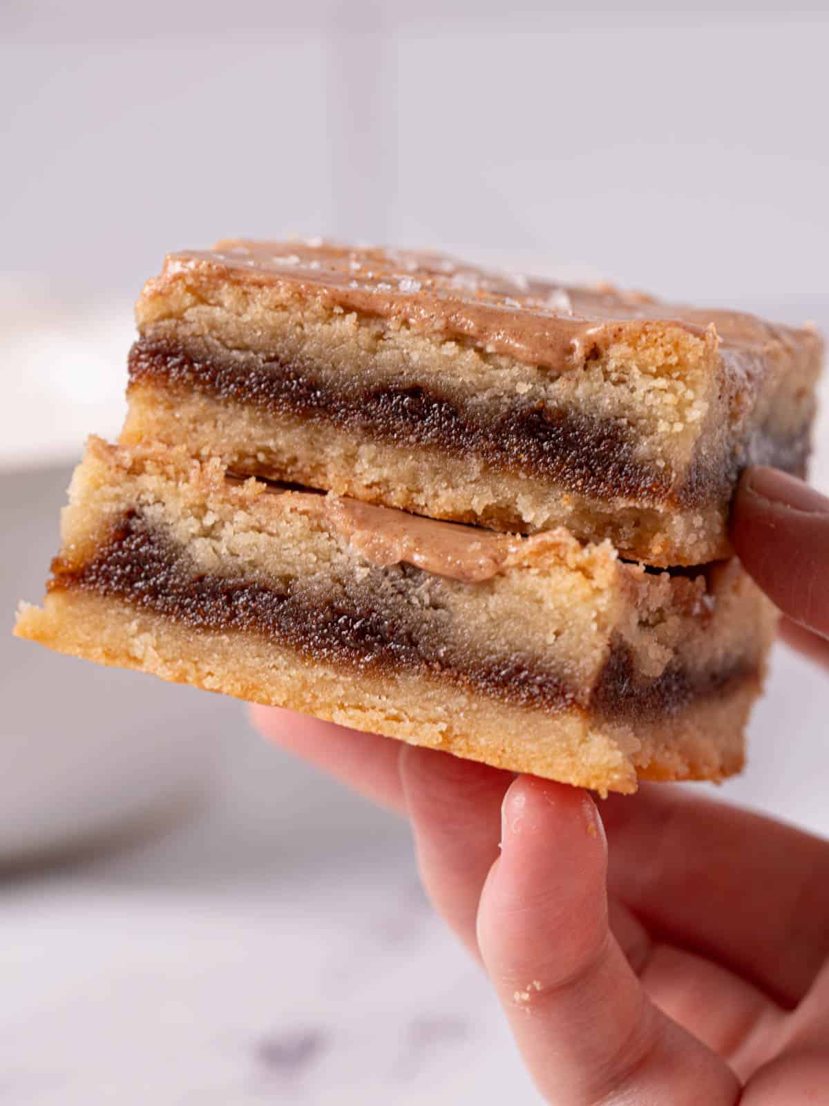 Closeup of the brown sugar cinnamon bars being held.
