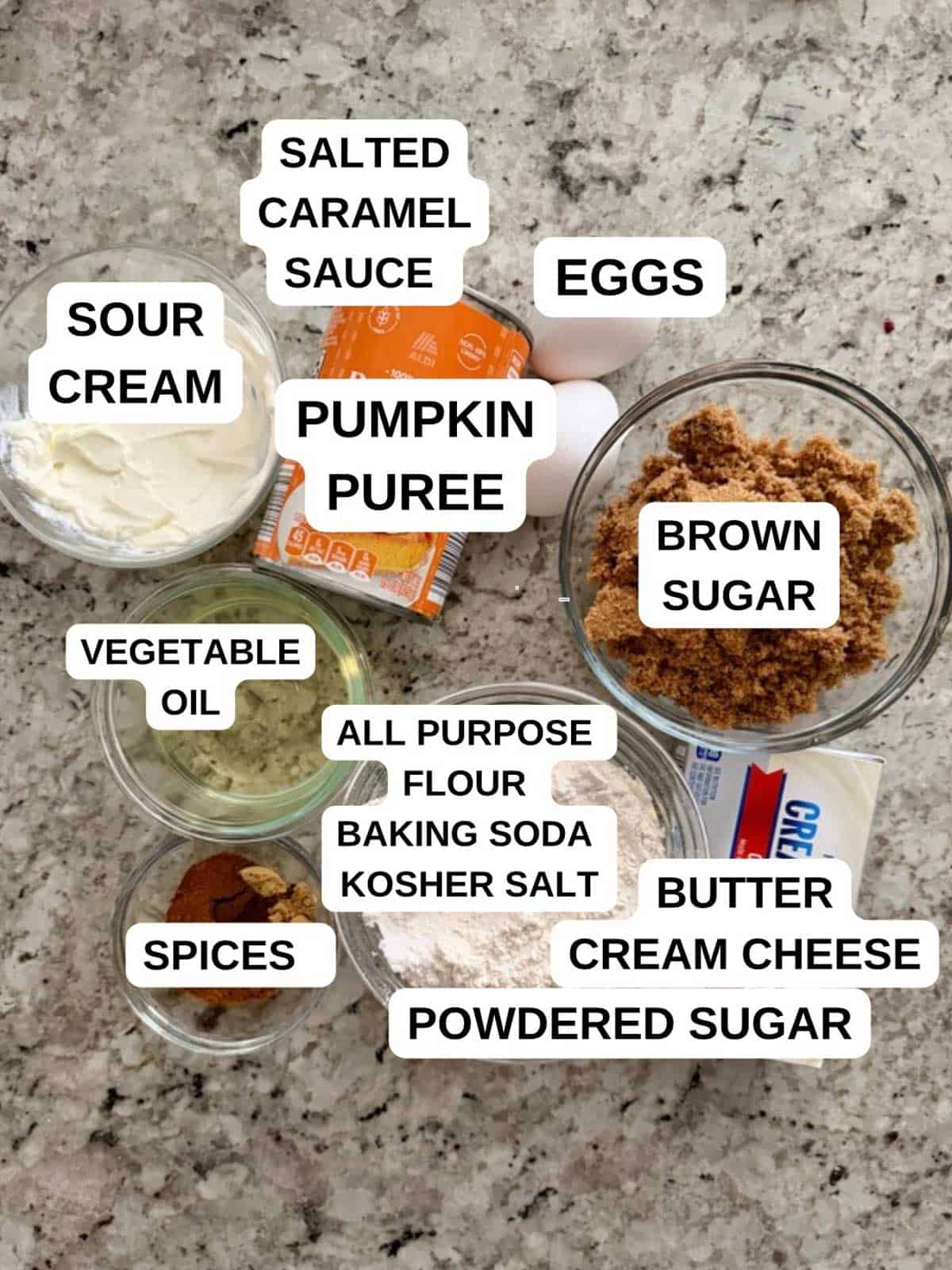 Ingredients labeled for the pumpkin caramel cake recipe on the counter.